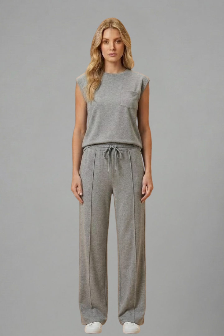 Two-piece women's loungewear set: relaxed short sleeve top and elastic waist shorts for ultimate comfort.