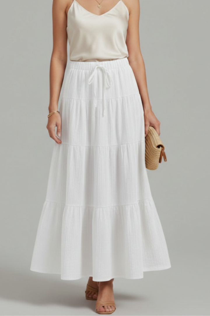 Comfortable women's tiered maxi skirt, elastic waist. Flowy, long, ideal for spring/summer fashion.