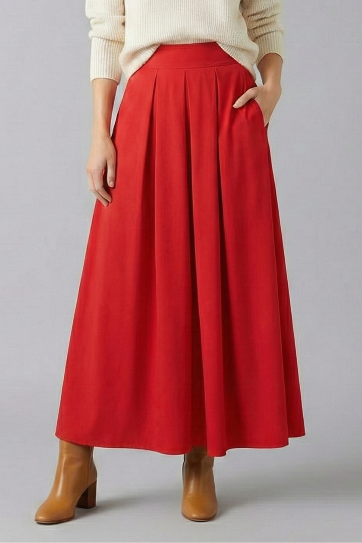 Chic spring women's high-waisted pleated long skirt with pockets, perfect for comfortable, stylish outfits.