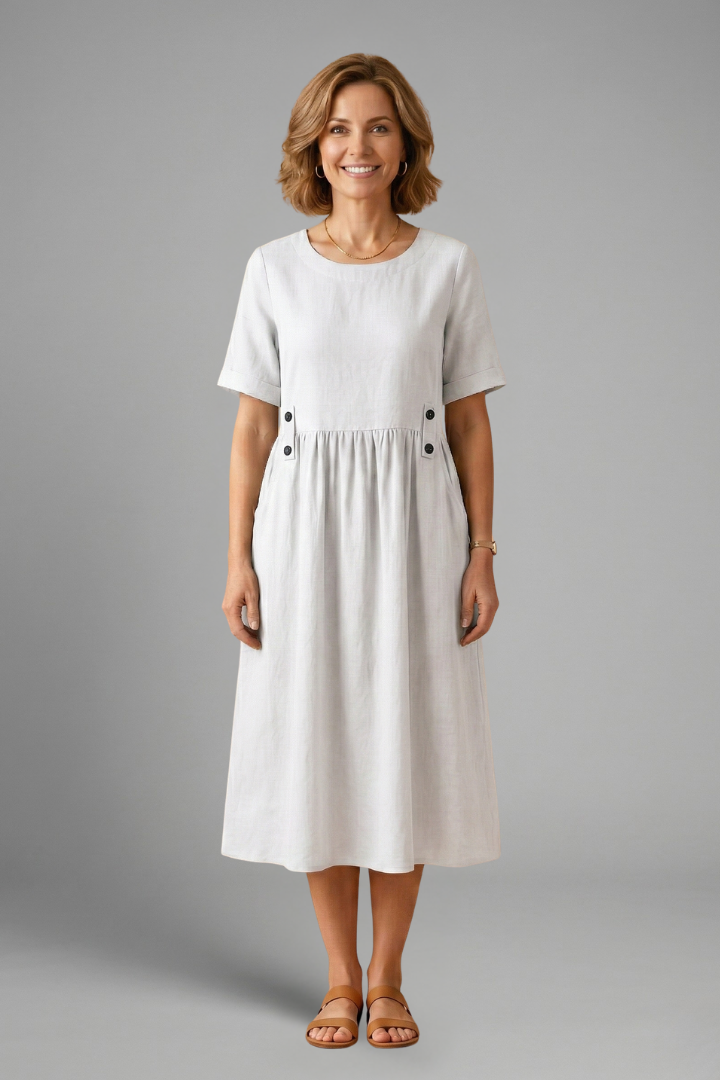 Stylish short sleeve round neck midi dress for women, offering a relaxed and loose fit.