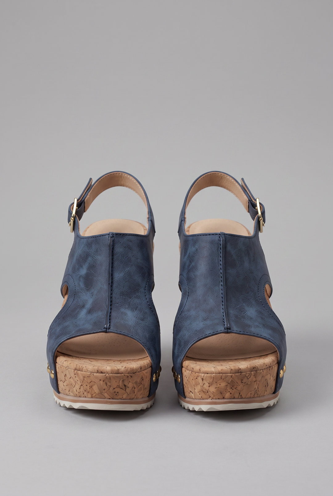 Women's open-toe platform wedge sandals with adjustable buckle for comfortable summer wear. Elegant casual footwear.