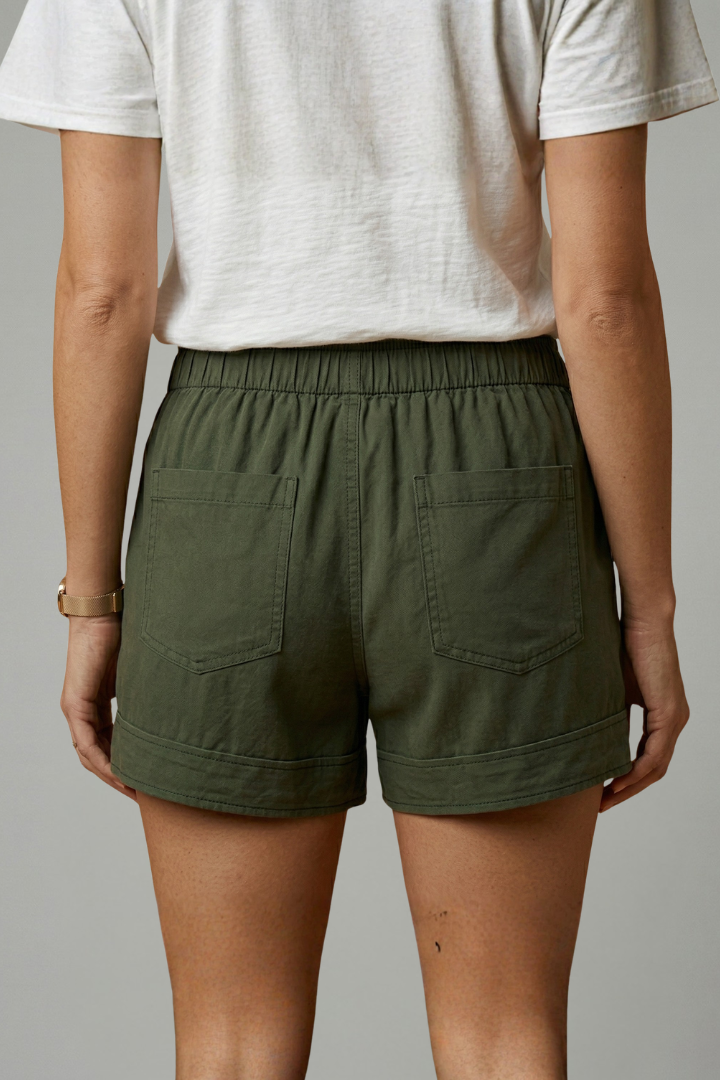 Versatile women's active shorts with pockets, drawstring waist, everyday style.