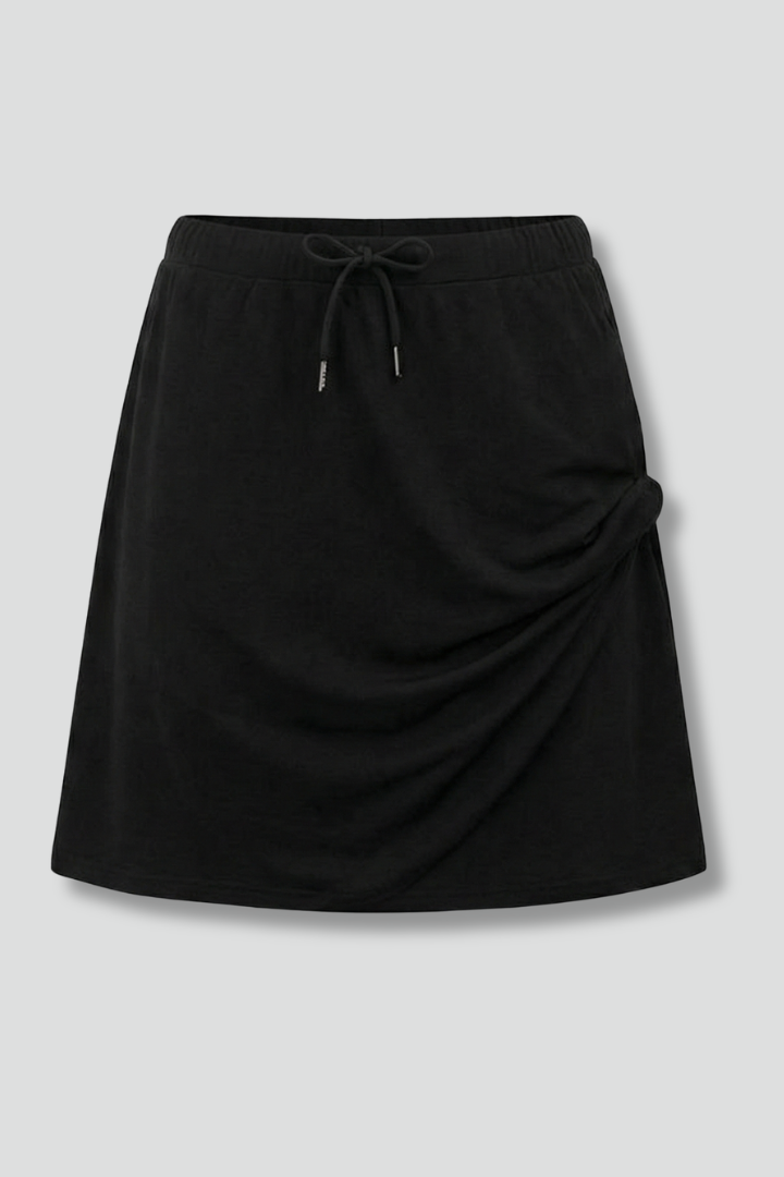 Women's drawstring skort for active comfort. Features built-in shorts & straight cut.