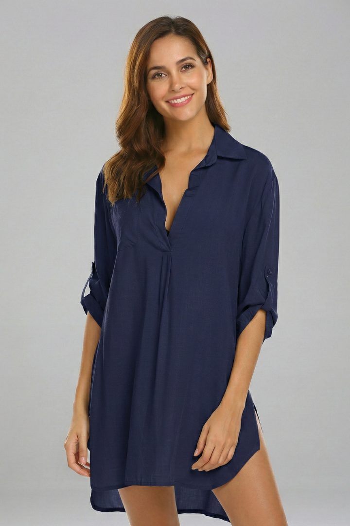 Everyday women's long sleeve tunic dress. Features a chic collar, V-neck, & loose fit for stylish comfort.