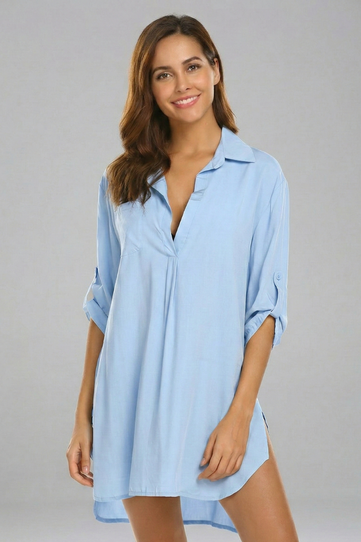 Spring/summer women's tunic dress. Long sleeves, collared V-neck, loose fit, and knee length for comfort.