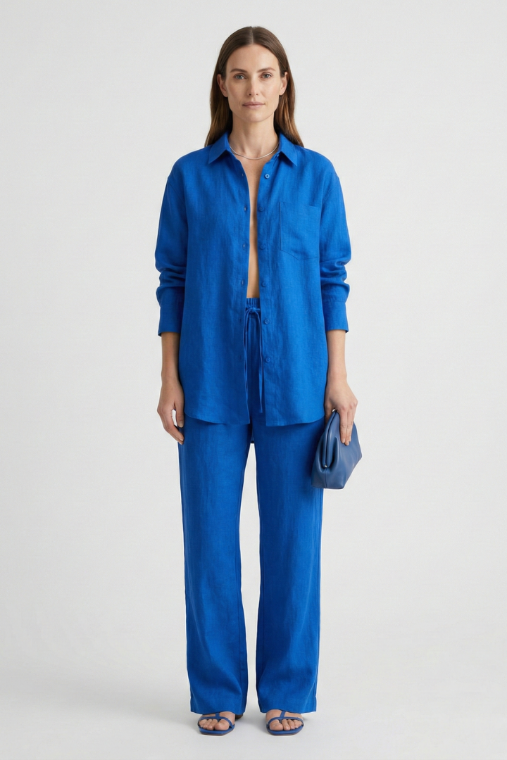 Chic women's matching set: long-sleeve button shirt & straight pants. Ideal for casual or office wear.