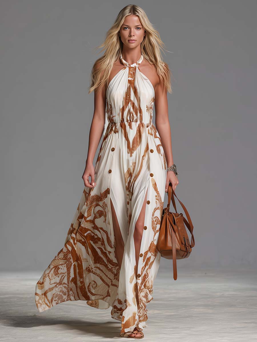 Women's abstract print halter neck flowy maxi dress, button side split. Ideal for vacation.