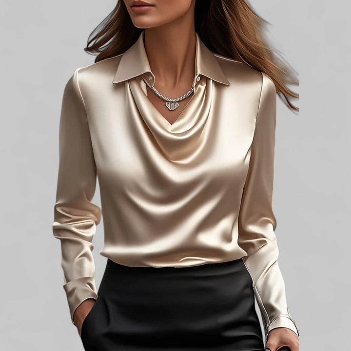Casual chic women's long sleeve blouse with a draped neck. An elegant top for versatile everyday fashion.