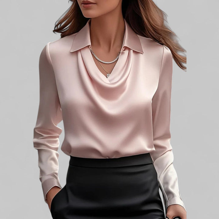 Modern women's draped neck long sleeve blouse. Professional and stylish top for a polished look.