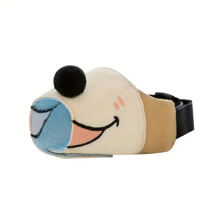 Adjustable light brown cartoon dog muzzle for small to XL dogs. Comfortable, breathable pet safety.