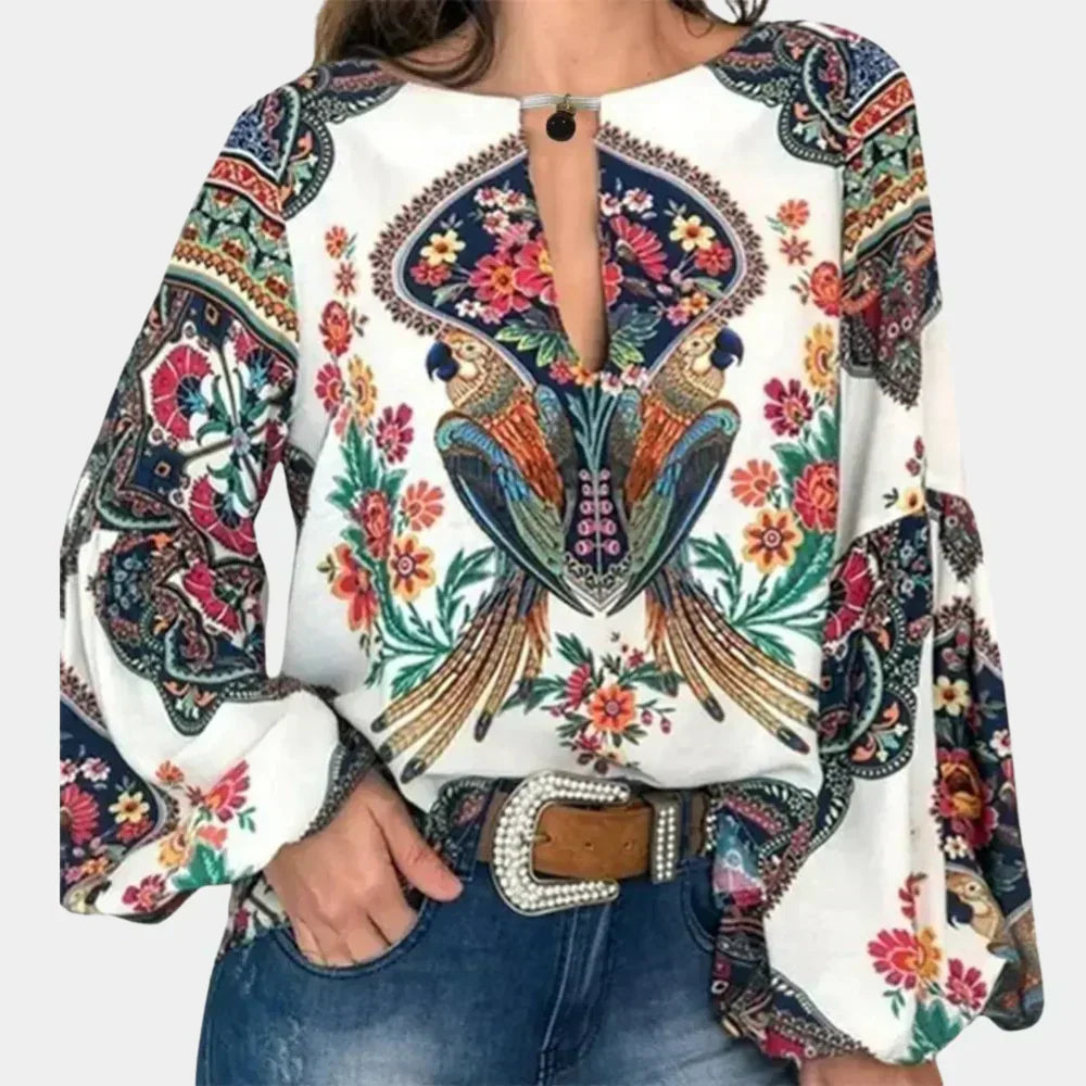 Women's breezy floral print summer blouse, perfect for casual chic vacation wear.