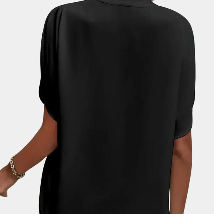 Comfortable airy women's summer top, short sleeve, ideal for vacation style.