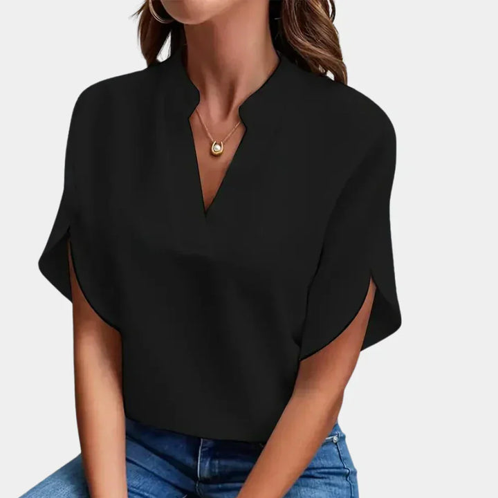 Women's breezy short sleeve summer blouse, loose fit, perfect for casual everyday wear.