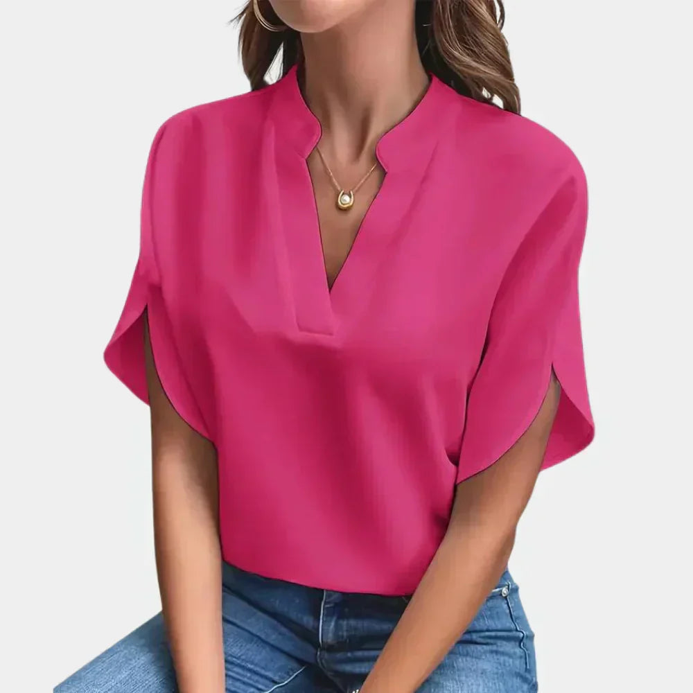 Stylish women's casual shirt, loose fit, versatile for daily or vacation wear.