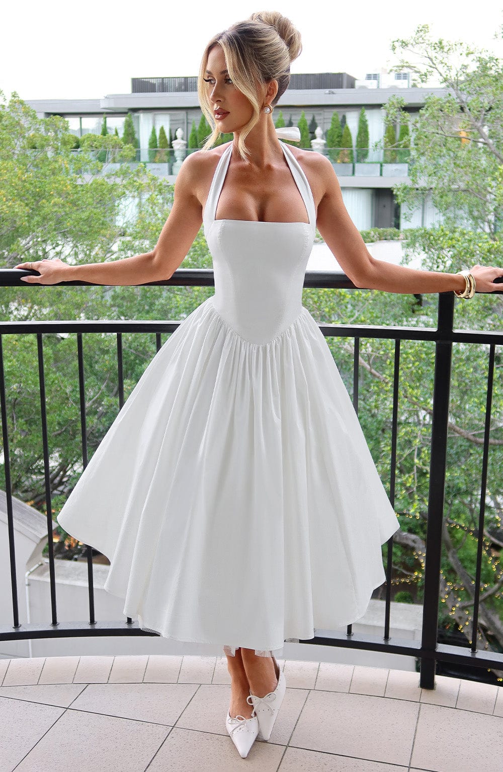 Ariana halter midi dress in black and white, women's wedding guest dress with fitted waist and flowy skirt