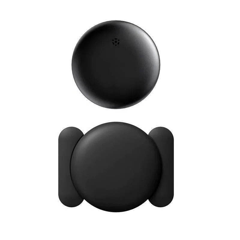 Magnetic GPS car tracker securely attached to a vehicle's underside, offering real-time asset tracking. Weatherproof design.