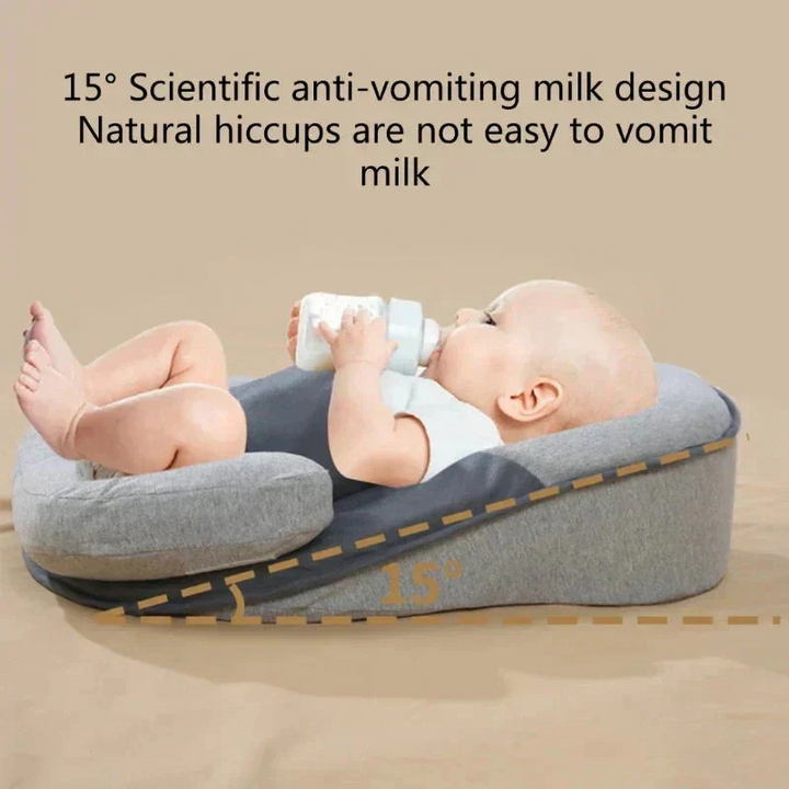 Portable inclined infant pillow for anti-spit-up support, ensuring comfortable & safe baby sleep.