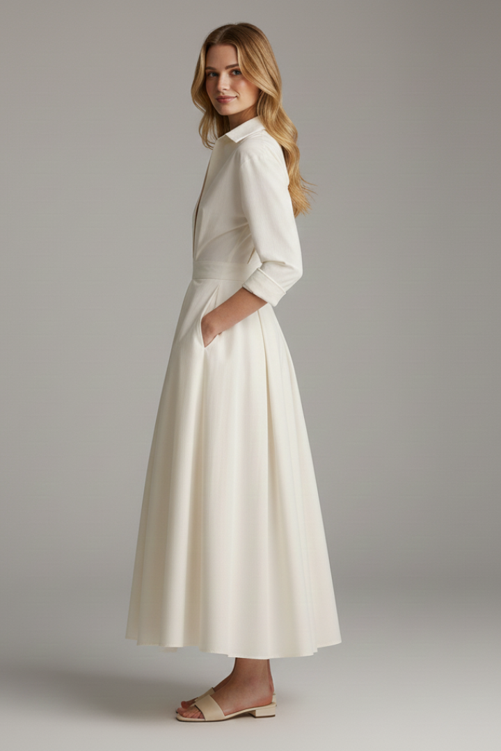 Versatile women's midi dress, long sleeve, defined waist, suitable for casual day wear or evening events.