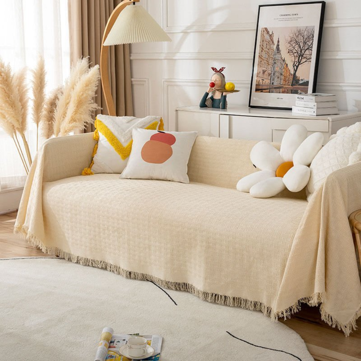 Machine washable stretchable sofa cover in beige, a pet-friendly slipcover for ultimate furniture protection.