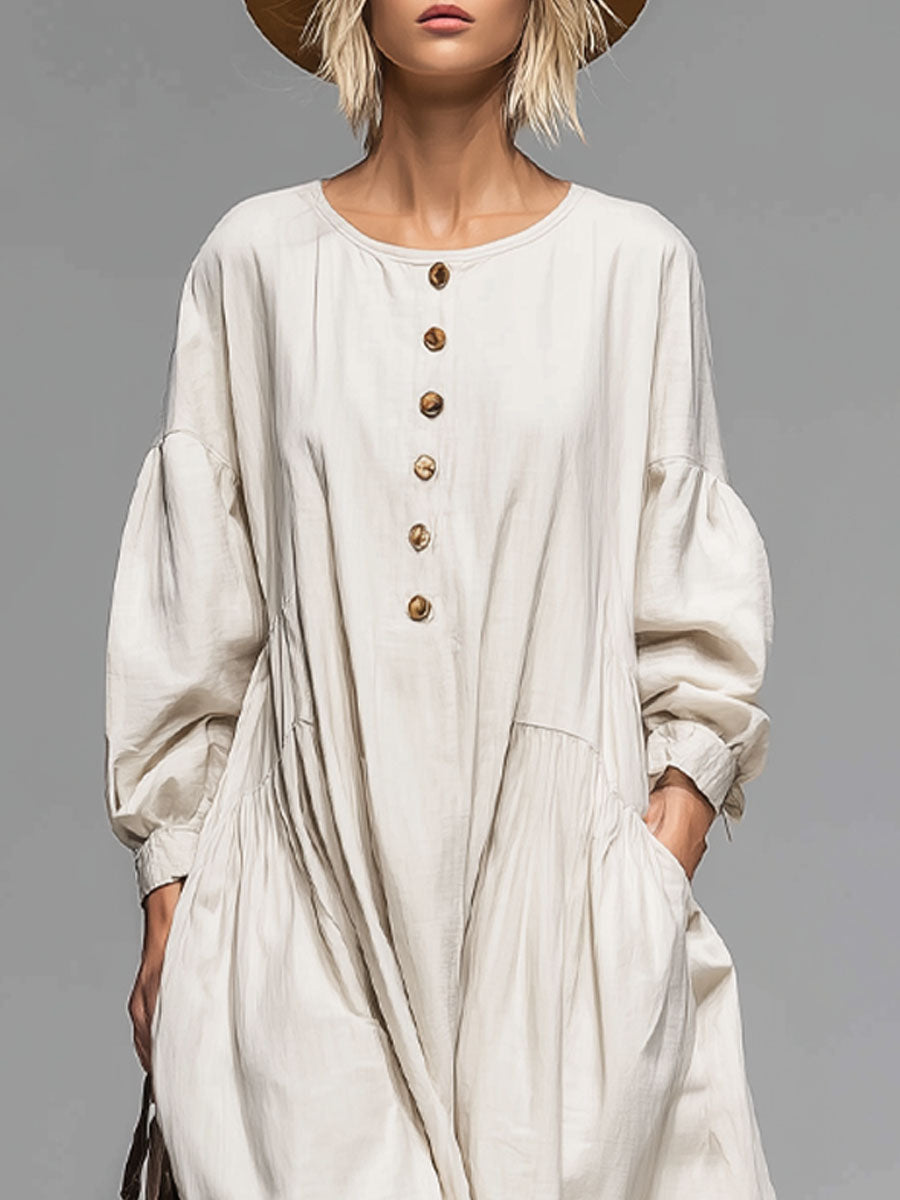 Comfortable loose-fit long sleeve midi dress for women, button-front with pockets. Versatile for spring/fall.