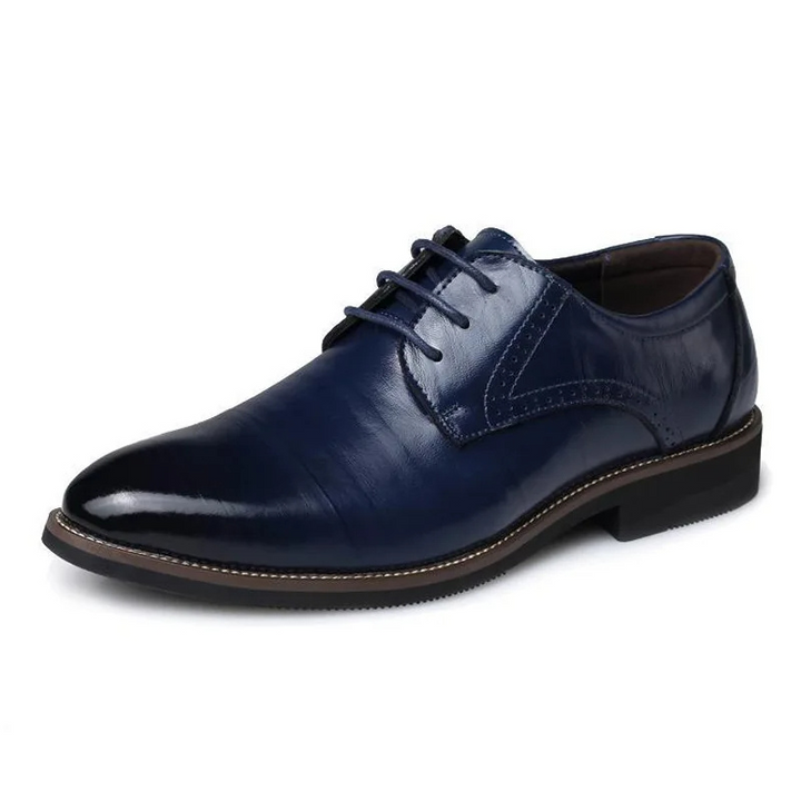 Rich brown men's classic lace-up Oxford shoes. Elegant formal footwear perfect for office, weddings, and sophisticated smart-casual.