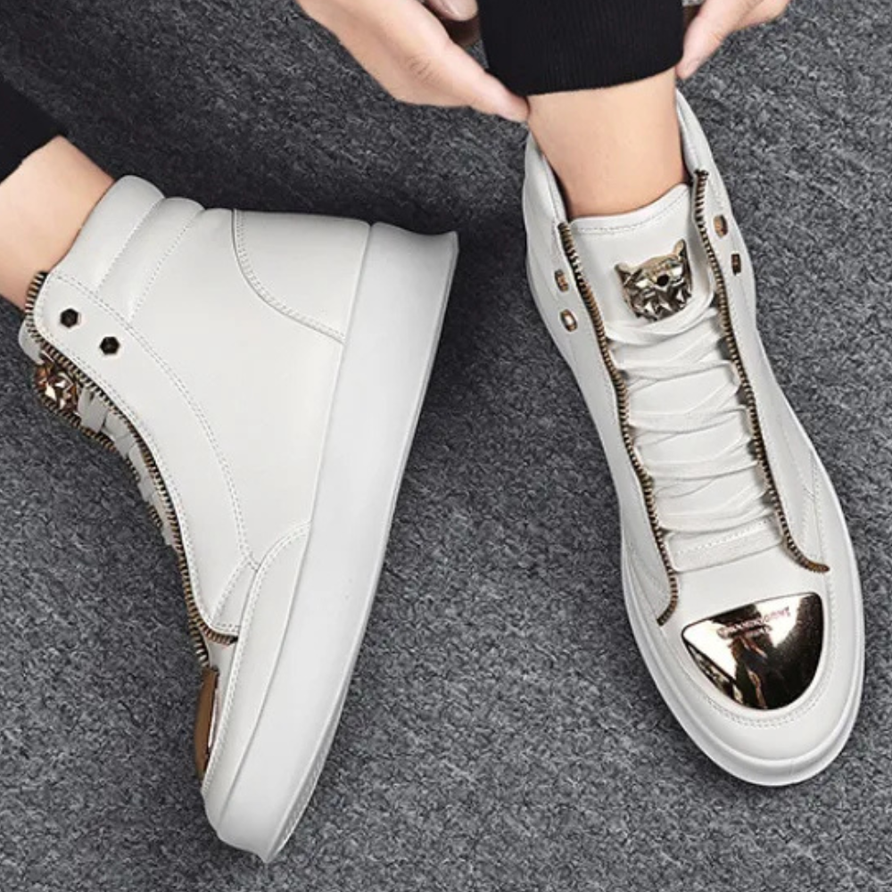 White & red high-top men's sneakers. Modern athletic shoes for street fashion, offering urban style & comfort.