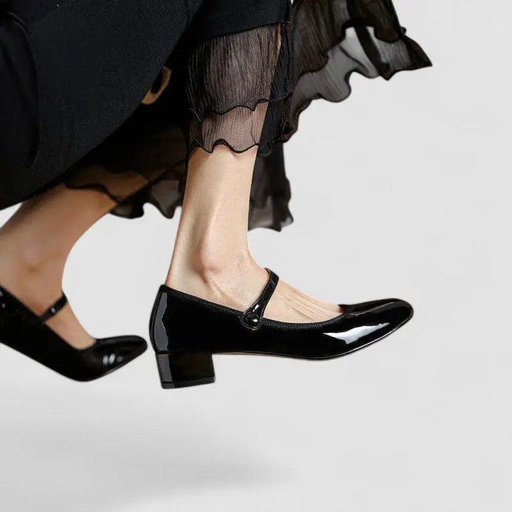 Elegant Red Noémie Mary Jane flat shoes for women, featuring orthopedic comfort and classic style.