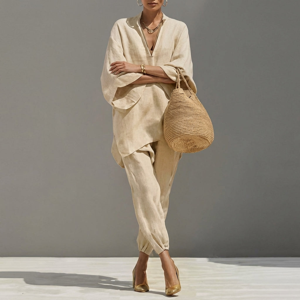 Women's relaxed fit tunic top & tapered pants matching set. Casual elegance, comfortable travel wear, everyday style.