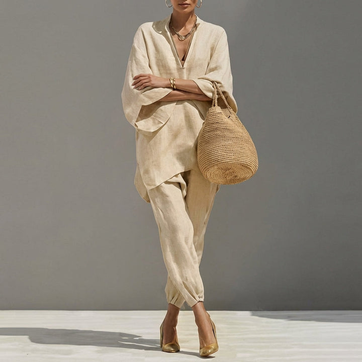 Women's relaxed fit tunic top & tapered pants matching set. Casual elegance, comfortable travel wear, everyday style.