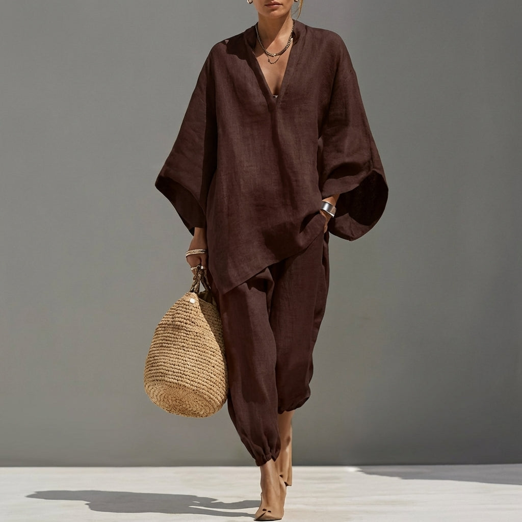 Versatile women's two-piece set: relaxed tunic top & tapered pants. Great for travel, casual elegance, everyday comfort.