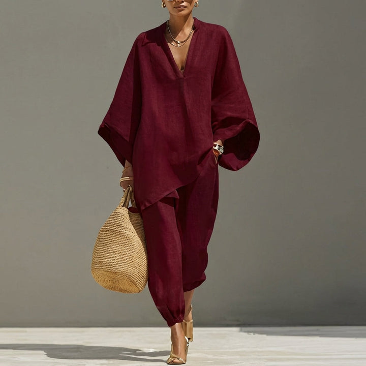 Full view of beige women's relaxed tunic top & tapered pants matching set. Comfortable, stylish, perfect for travel.