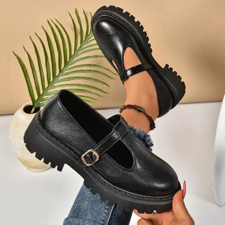 Women's T-strap platform Mary Jane orthopedic shoes, side view highlighting classic design & foot support.