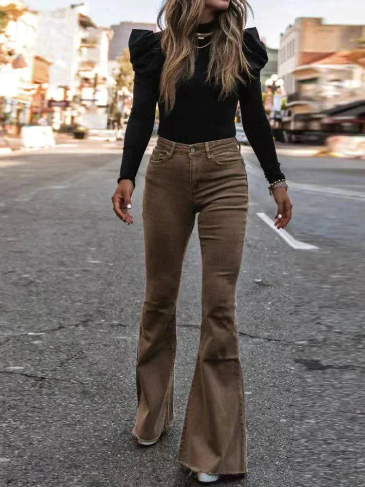Dark blue women's high waist flare trousers, perfect work pants with functional pockets.