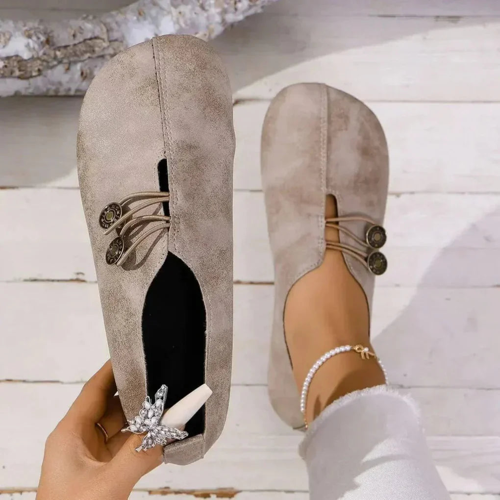 Brown slip-on orthopedic shoes for women, offering minimalist style and flexible daily foot support.