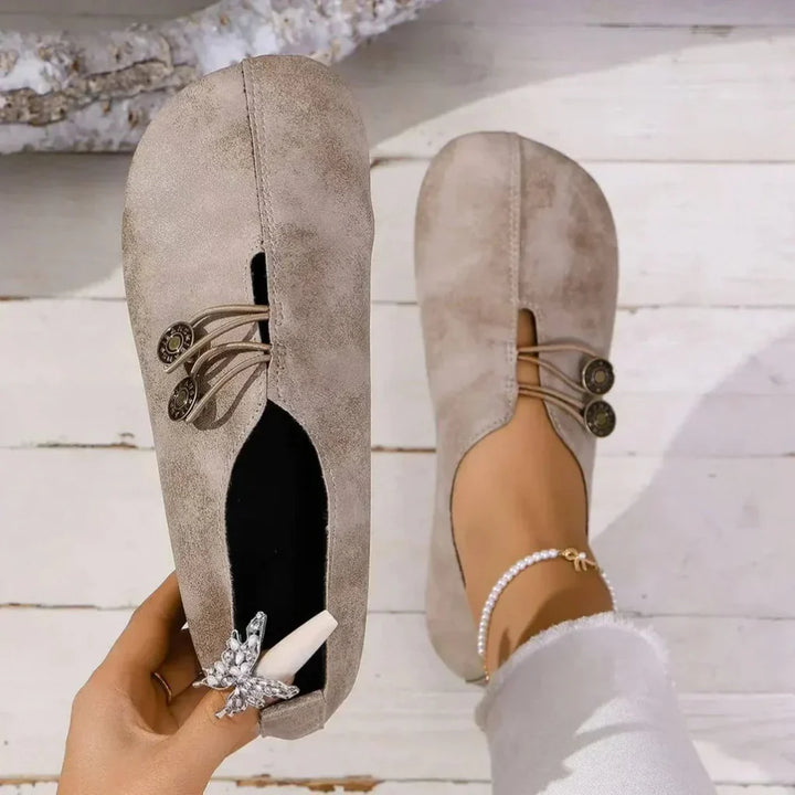 Brown slip-on orthopedic shoes for women, offering minimalist style and flexible daily foot support.