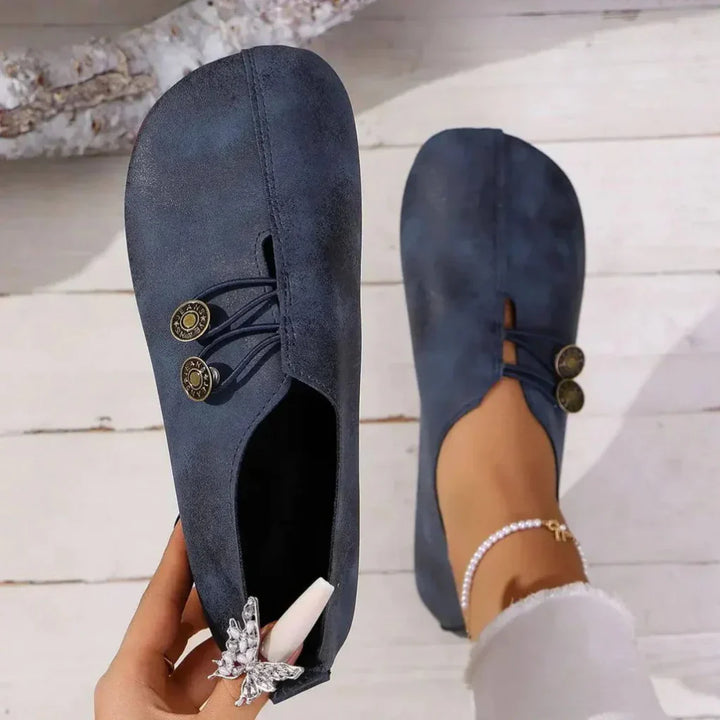 Black casual women's shoes with orthopedic foot support, designed for all-day comfort and daily wear.