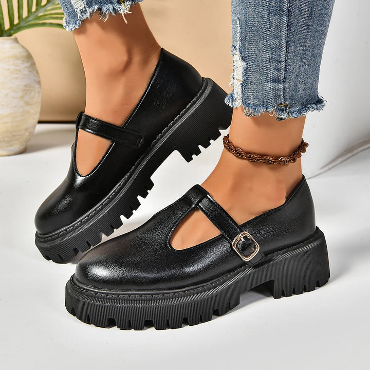 Black women's orthopedic platform Mary Jane shoes with T-strap buckle for all-day comfort and foot support.