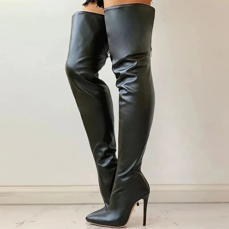 Stylish women's evening boots: over-the-knee, sharp pointed toe, and slender stiletto heel for a chic look.