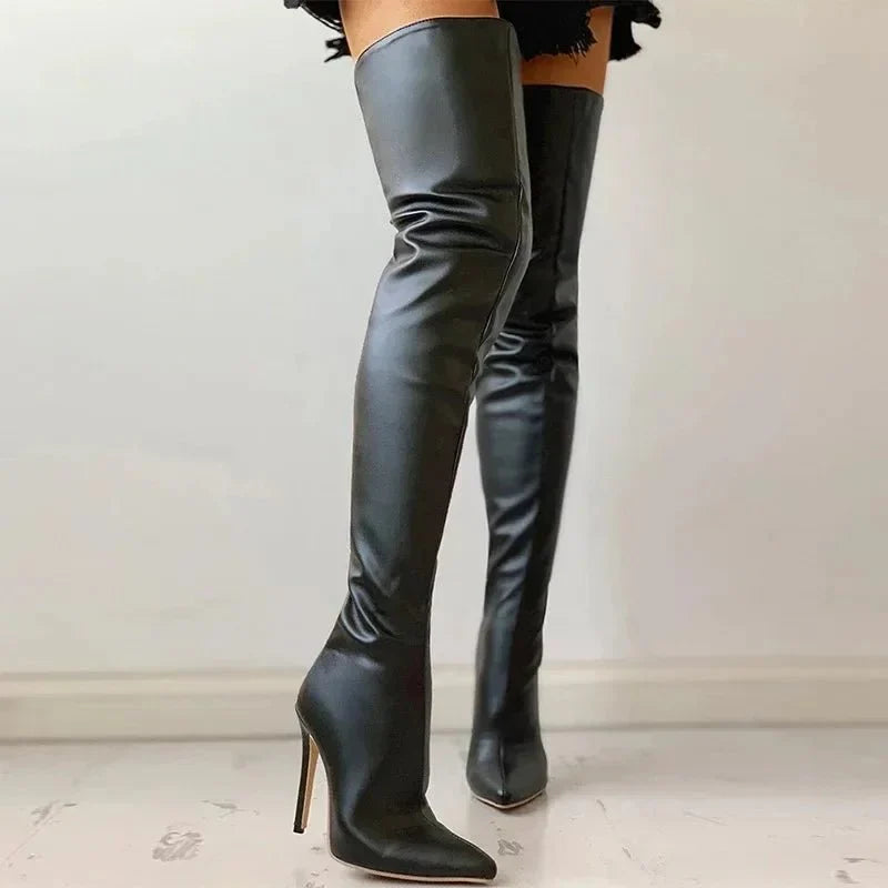 Women's formal over-the-knee boots. Features a classic pointed toe and a sophisticated high stiletto heel.