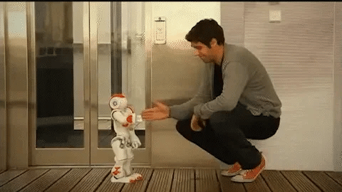 Kids' interactive robot with blue details, designed for easy gesture control and fun learning.