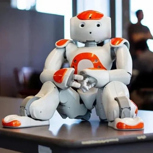 Red educational robot toy for children, with gesture control, talking, and dancing features.