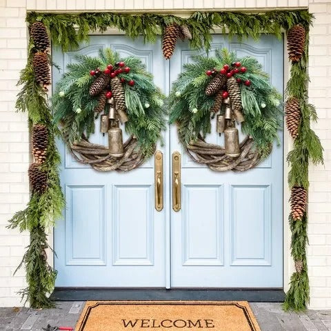 Bohemian Christmas wreath with floral, pinecone & berry accents. Versatile holiday decor for front doors.