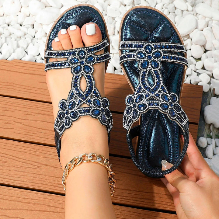Women's casual boho sandals with cushioning for everyday comfort. Ideal summer slip-on footwear.