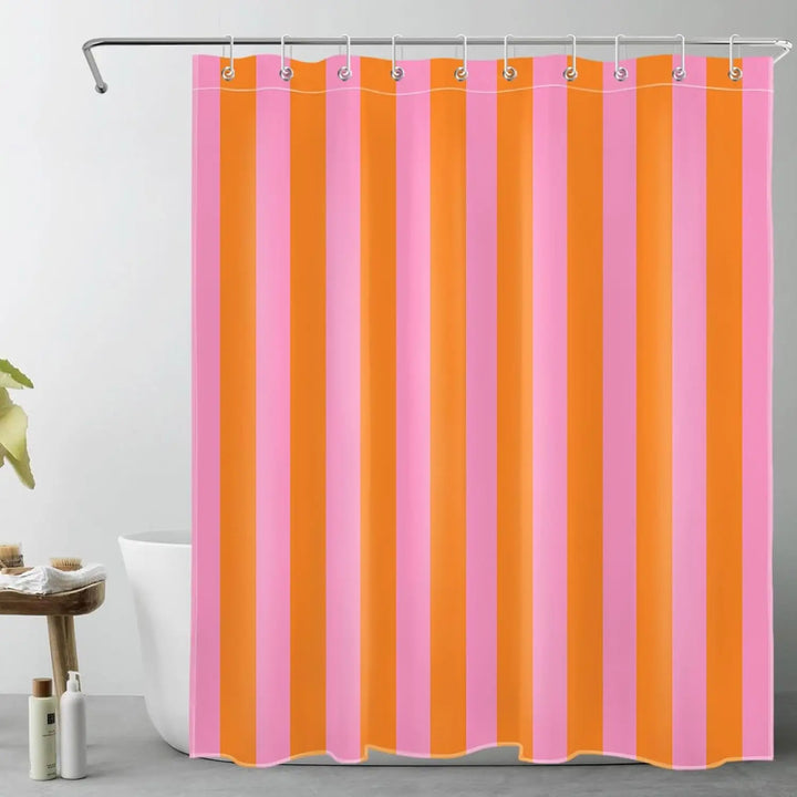 Colorful striped fabric shower curtain with a boho design, enhancing any bathroom decor.