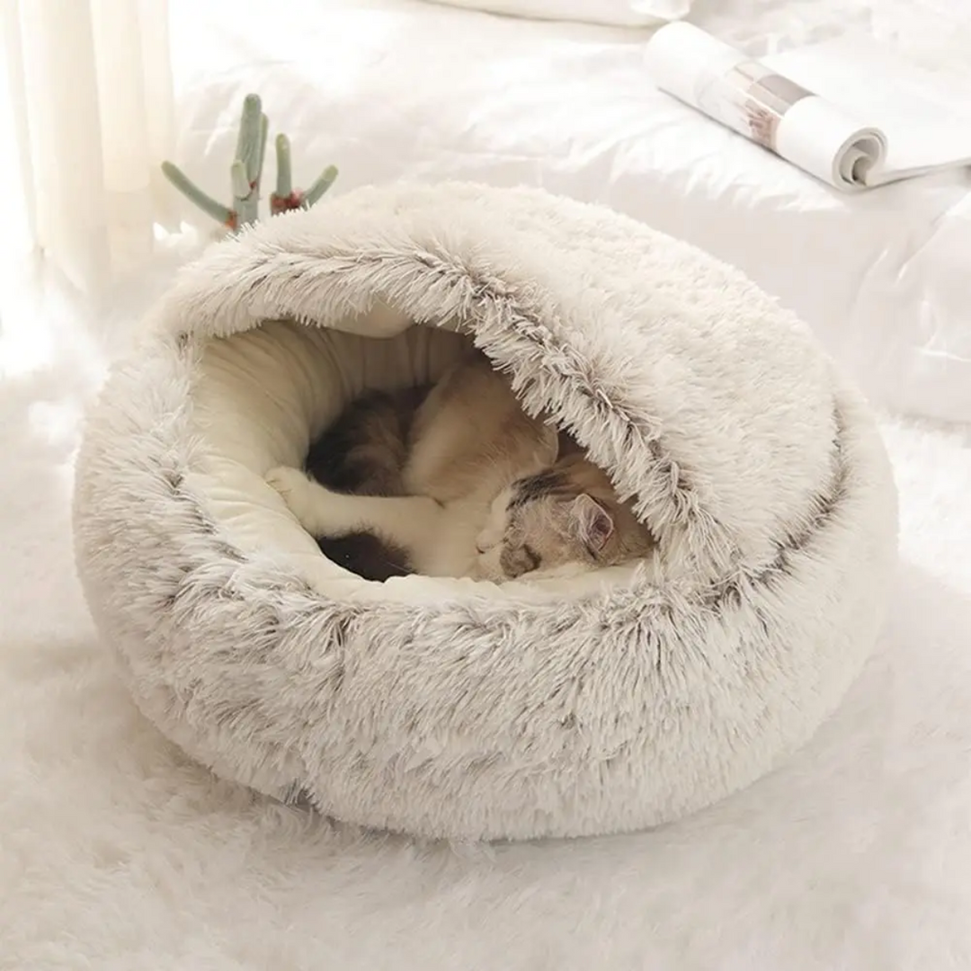 Stylish Calming Dog Bed with cozy cave. Promotes deep sleep & pet comfort, reducing anxiety.