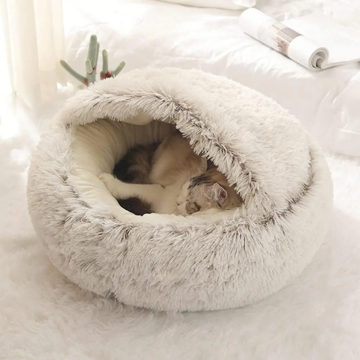 Stylish Calming Dog Bed with cozy cave. Promotes deep sleep & pet comfort, reducing anxiety.