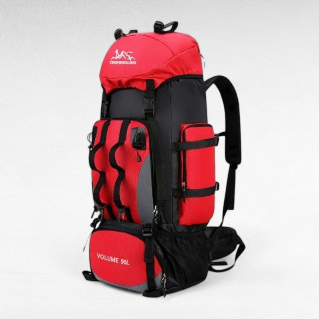 Durable, water-resistant 90L trekking rucksack for outdoor adventures, featuring comfortable padded straps.