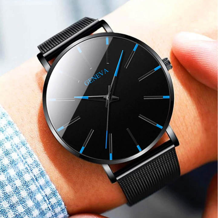 Elegant men's quartz watch featuring a minimalist design, subtle blue dial accents, and a classic black strap.