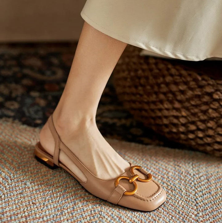 Women's flat shoes: elegant, ergonomic slingback design with cushioned comfort for versatile style.