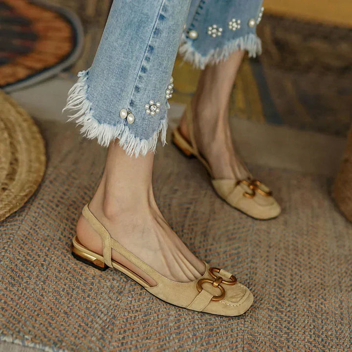 Stylish women's footwear: slingback flats with ergonomic support, ideal for chic daily or dressy wear.